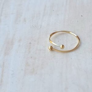 Anillo de cadena fina con dos bolitas finales acero oro