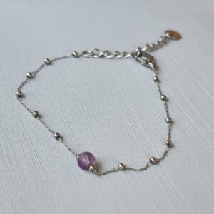 Pulsera acero plata con amatista central y bolitas de acero